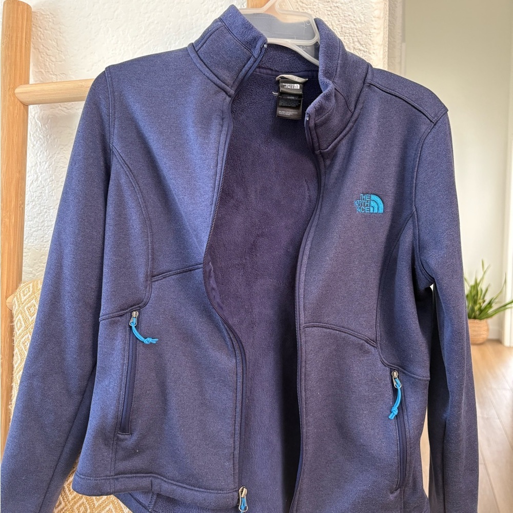 The North Face Women's Dark Navy Blue Fleece Jacket with Teal Logo